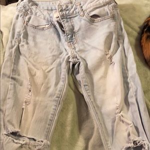 Distressed skinny jeans.